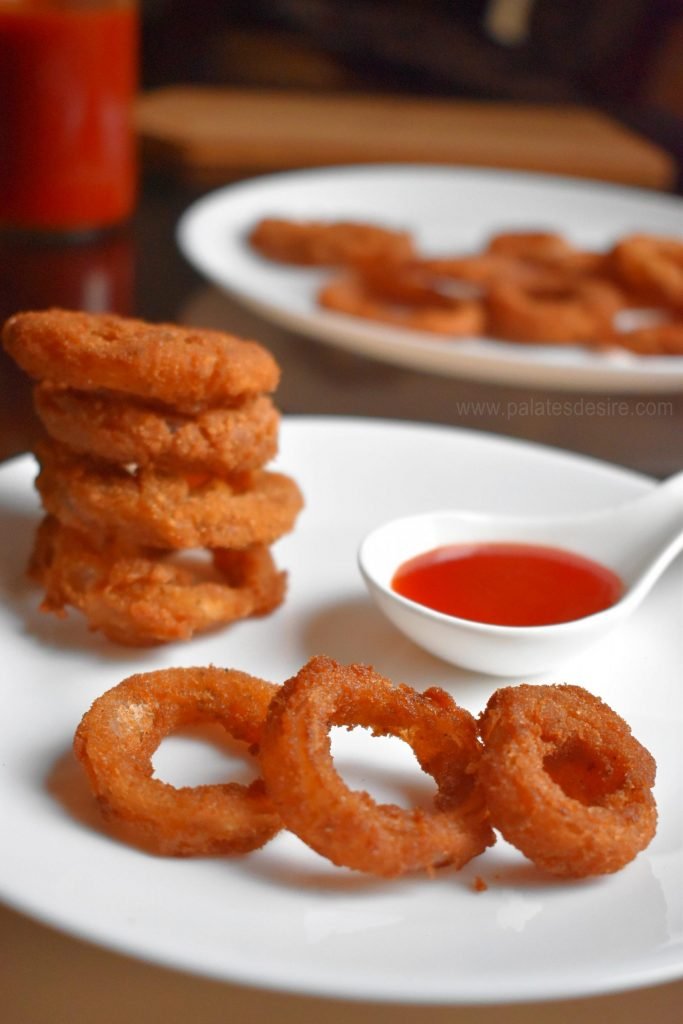 crispy onion rings with sauce